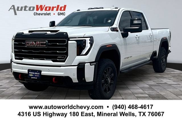 2025 GMC Sierra 2500 HD AT4 in Summit White — front three-quarter view