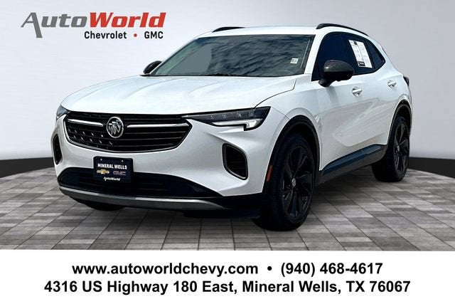 2022 Buick Envision Essence in Summit White — front three-quarter view